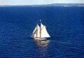 Lawn of Maine Oceanfront Home with Coastal Maine Schooner and Mountains